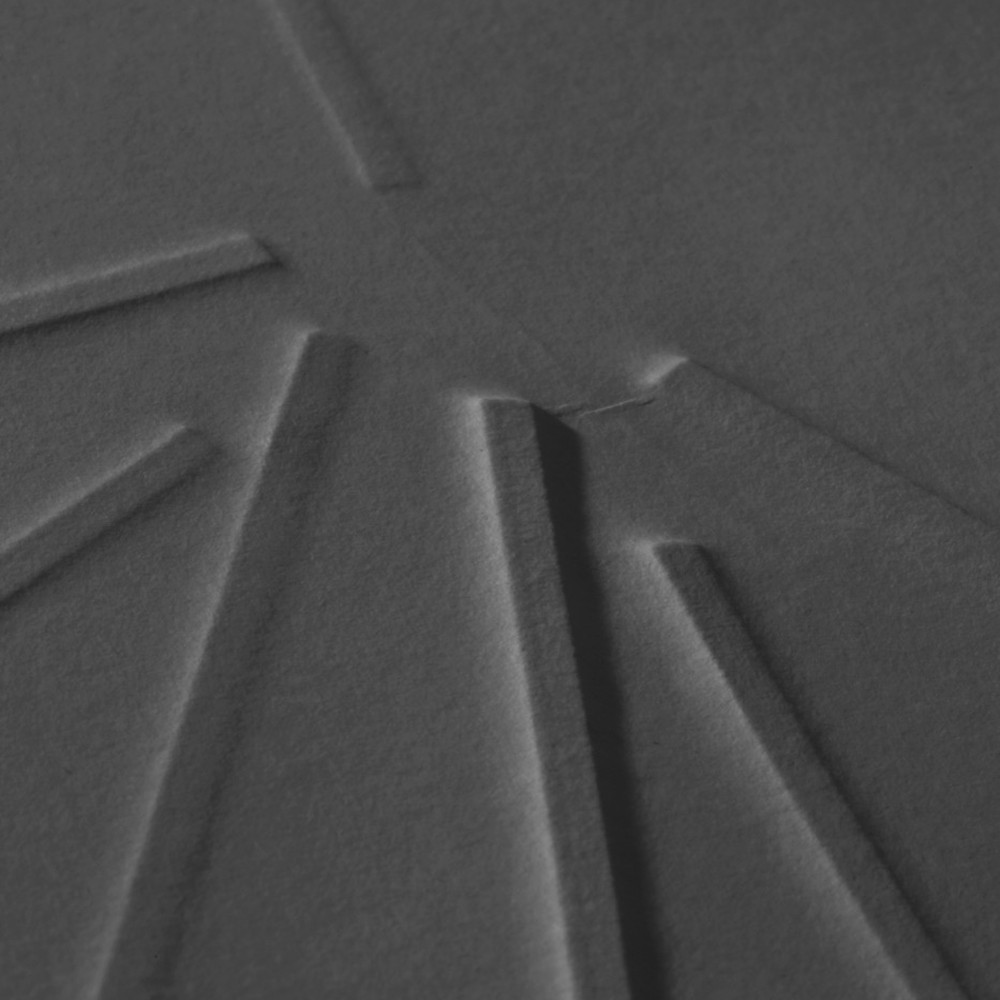 Líneas grabadas sobre papel negro